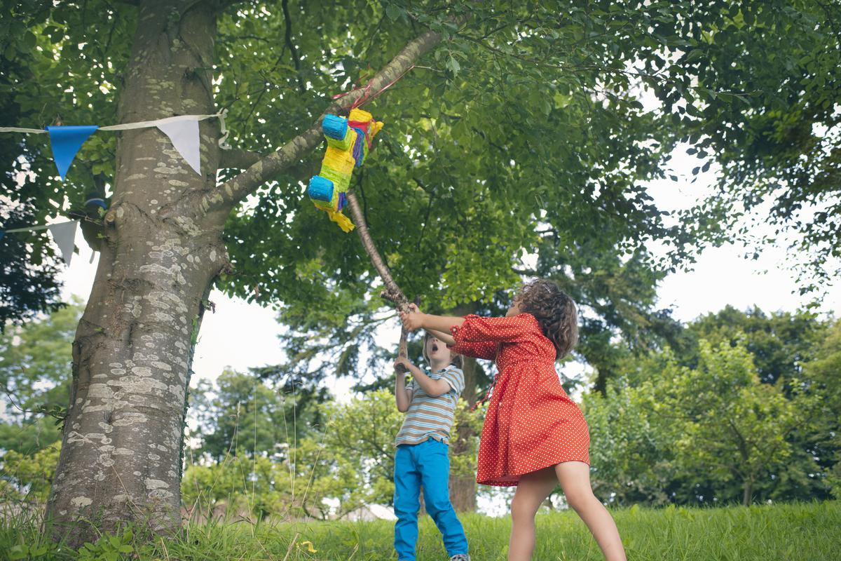 outdoor event with kids and pinata